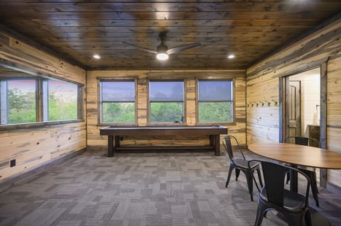 A shuffleboard table in the loft.