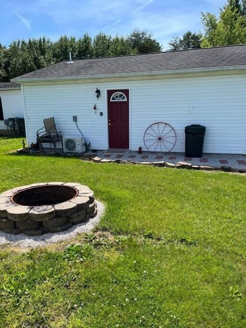 The red door you will enter upon arrival.