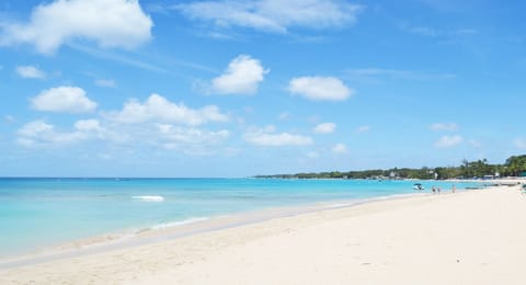 On the beach, sun loungers, beach towels