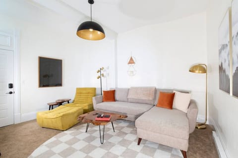 Spacious living room. The couch turns into a sleeper sofa. HD TV with cable.