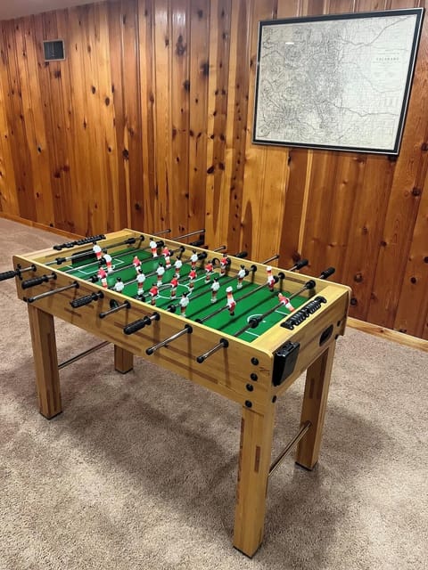 Foosball Table for Family Fun – A game table perfect for all ages, providing endless entertainment and friendly competition for the entire family.