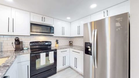 Don't miss out on this stunning kitchen!