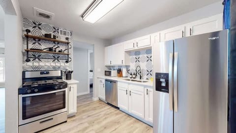 Unleash your inner chef in this gorgeous and functional kitchen.