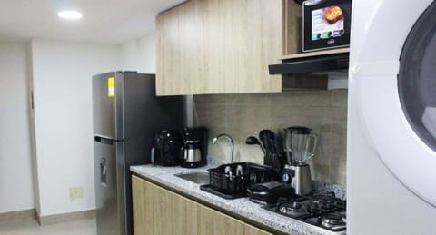 Fridge, microwave, coffee/tea maker, toaster