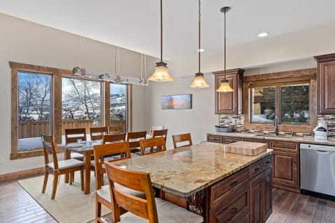 Gather at the bar and dining room table for a delicious meal!