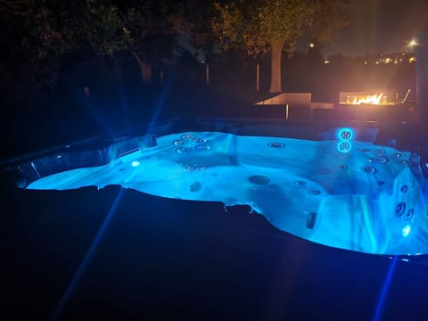 Private hot tub and gas firepit with lots of comfortable furniture