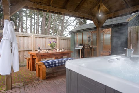 The Old Ministers House hot tub BBQ area and seating