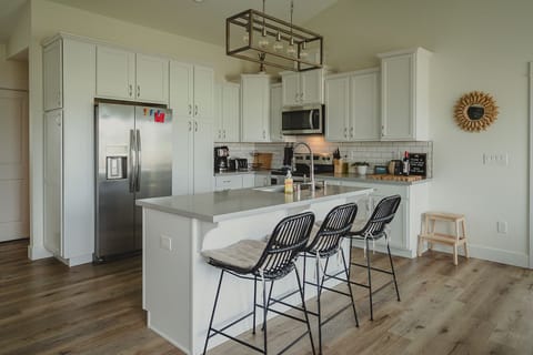 Bar seating and open concept kitchen