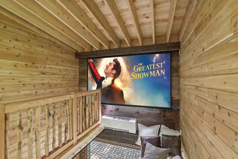 The large projection screen in the loft is the best place to watch a movie