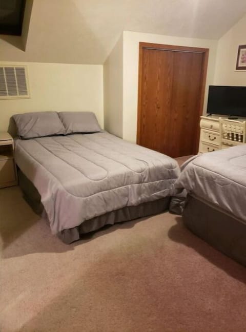 Iron/ironing board, travel crib, free WiFi, bed sheets