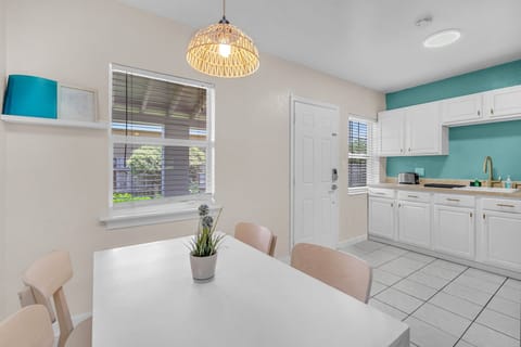 Dining table provides a cozy setting for your meals and can comfortably accommodate up to four people.