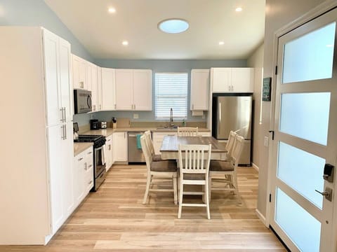 Back: Entryway and kitchen