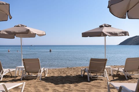 On the beach, sun loungers