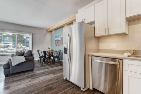 Embrace the convenience of our fully-equipped kitchen, strategically positioned for seamless access from the living room and dining area.