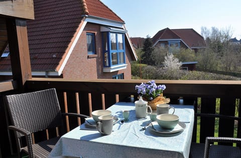 Balcony with Table and Chairs