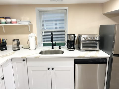 Fridge, microwave, dishwasher, coffee/tea maker