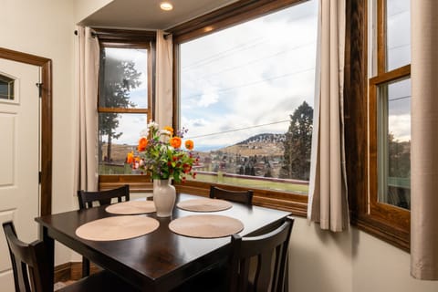 Take in beautiful views of the mountains from the dining table