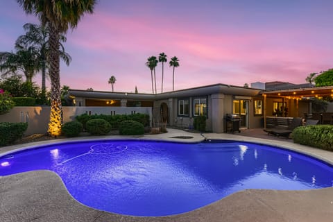 Resort style pool w/ lighted/mister/shaded outdoor dining, relaxing and lounging