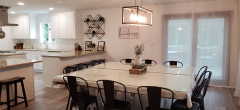 Dining Room. The table seats 12 comfortably with 4 more at the counter.