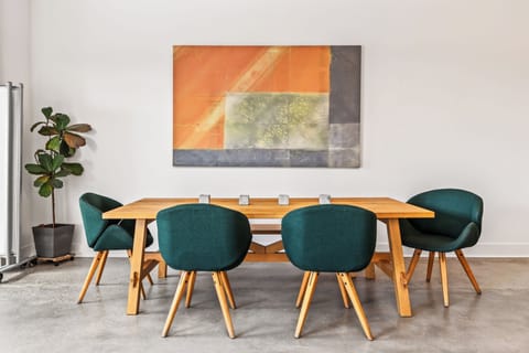 Dining area. Chairs by Bogus Studio.  Artwork by Barbara Forthal Carruth
