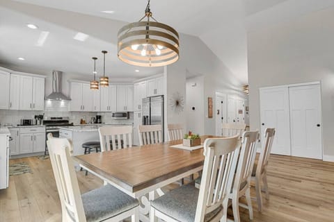 Open concept living space from kitchen to dining area and living room