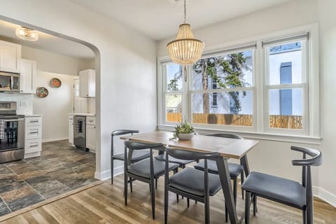 Unit A: Circle around for home-cooked food or delicious takeout around table with plenty of open light flowing in!