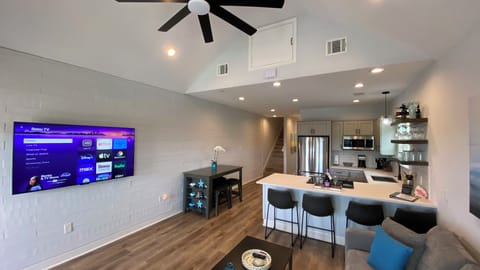 65” Roku TV—stream your favorite shows.