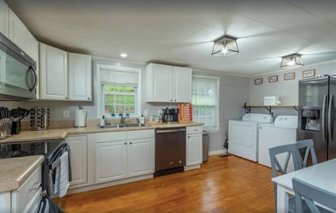 Kitchen stretching to dining table.