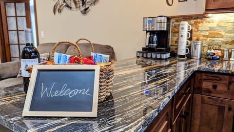 Savor a cup of coffee or relax with a glass of wine in the immaculate kitchen