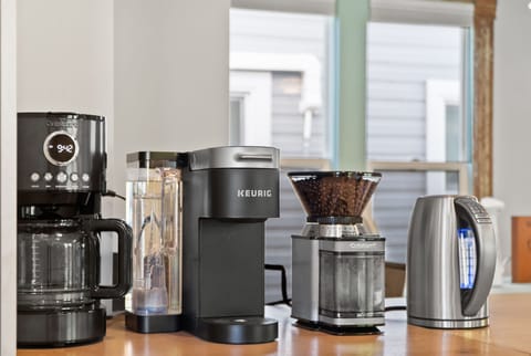 Coffee bar! Cuisinart 12 cup drip coffee maker, bean grinder (filled with Starbucks beans), and a Keurig (pods provided for your first morning), electric kettle (sampling of hot teas provided)