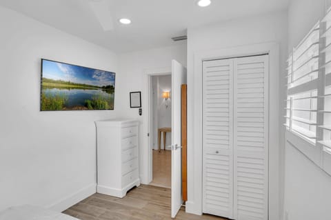 The third bedroom has a King bed and features a smart T.V.