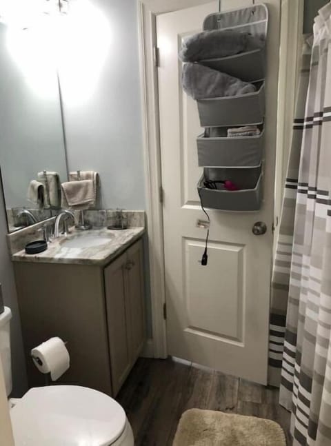 Combined shower/tub, hair dryer, towels, soap