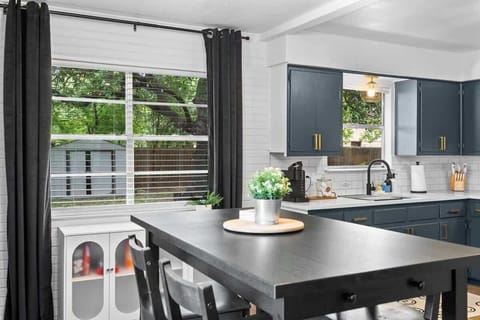 "Enjoy a versatile dining and workspace area, perfect for both meals and productivity. The dining table provides a comfortable spot for family meals, while the dedicated workspace ensures you have a functional area for work or study, all within a wel