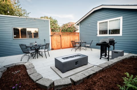 Spacious Backyard with Outdoor Seating, Gas Grill, And Gas Firepit