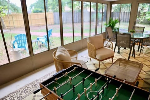 Play games, relax, or enjoy meals in this peaceful, light-filled sunroom