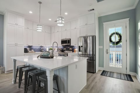 Kitchen with oversized island perfect for entertaining