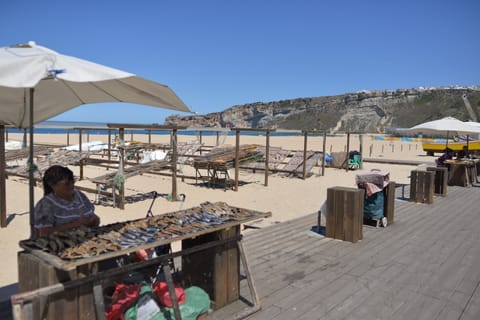 Beach nearby, sun loungers