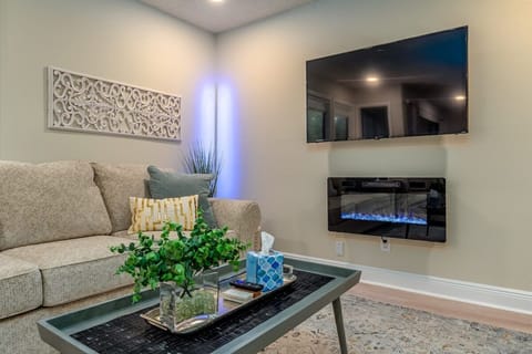 Kick back and enjoy the LED Fireplace (with or without heat) while watching your favorite movie on the 55" Roku TV