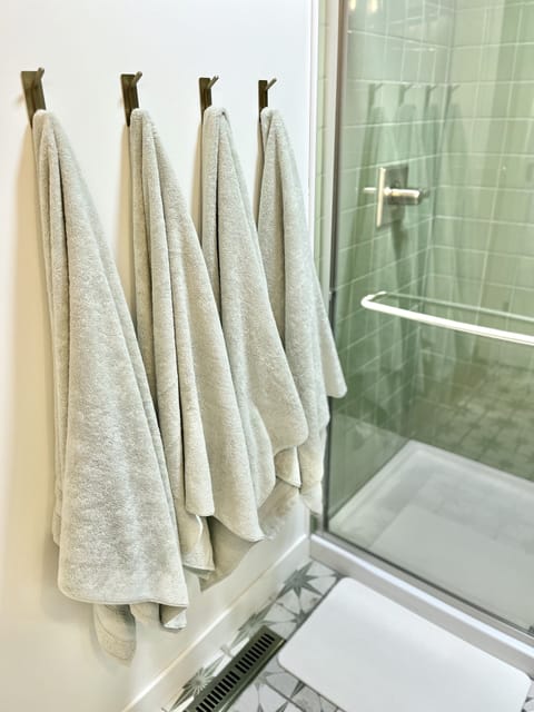 Shower, bathrobes, towels, soap