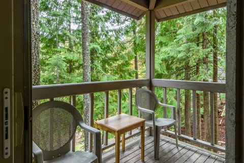 Shared deck with sliding glass door connecting to the living room