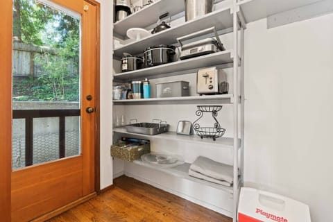 The pantry is stocked with all the appliances you`ll need for your meals.