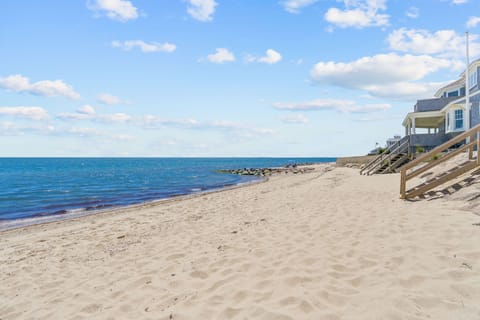 On the beach, sun loungers, beach towels