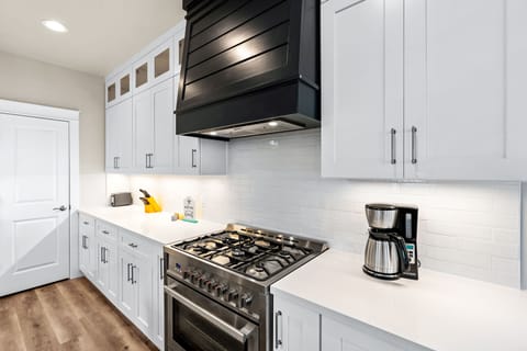 Prepare amazing meals in this gourmet kitchen with gas stove!