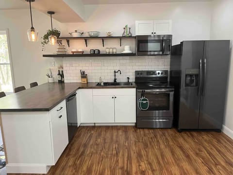 Fridge, dishwasher, dining tables