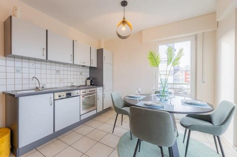 Prepare your favorite dishes in our fully stocked kitchen with a delightful window view.