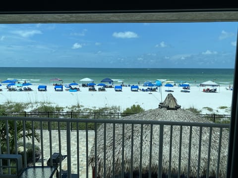 On the beach, sun loungers, beach towels