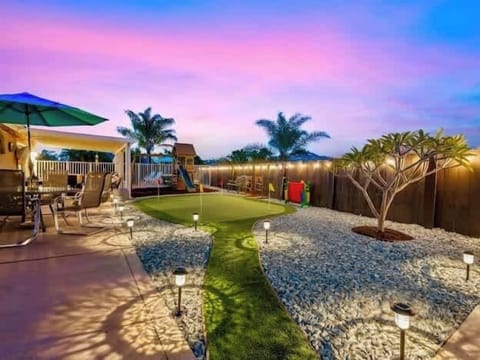 Well maintained and lit backyard view!