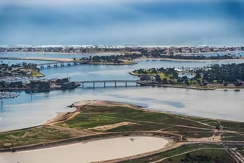 Breathtaking bay views await! Enjoy panoramic vistas of Mission Bay, San Diego from your cozy retreat. Watch sailboats glide across the water and soak up the California sunshine. Perfect for couples or families seeking a peaceful getaway.