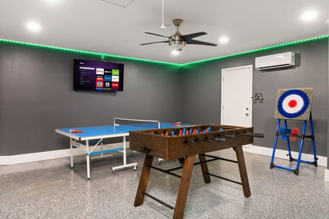 Get ready for endless fun and excitement in our action-packed game room, equipped with ping pong, foosball, and even axe throwing for a thrilling experience.