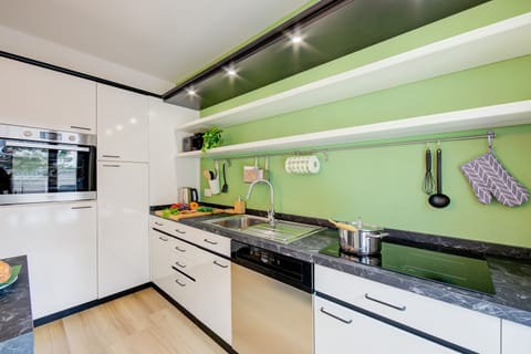 The bright kitchen with snack corner